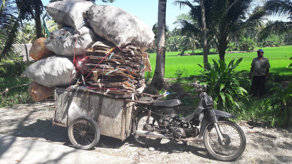 Indonesian Waste Recycling Trader Motorbike